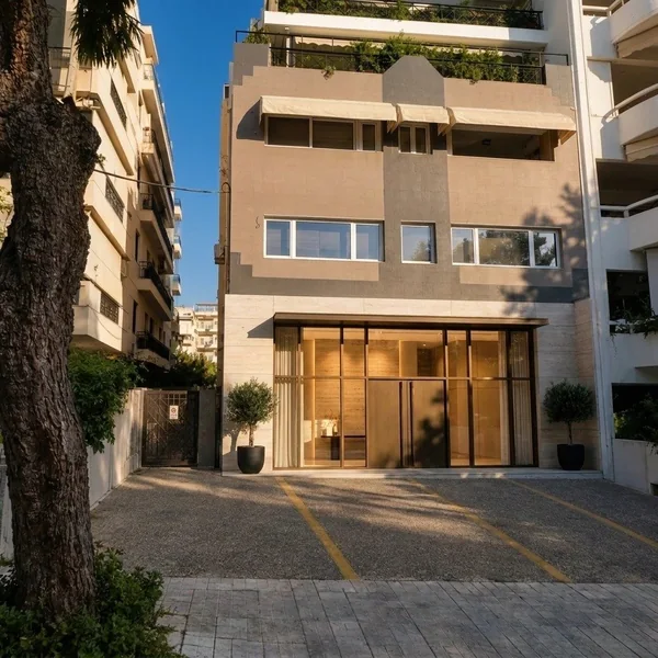 The entrance of Glyfada Maison Residences at dusk